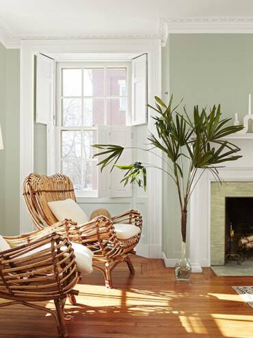 light-green-paint-living-room-wall-white-shutters-mantel-640x640